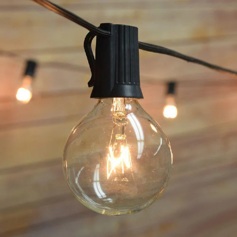 Color - Changing LED String Lights for Christmas DecorCLOSEOUT 28 FT 25 Socket Outdoor Black Patio String Light Cord With Clear Globe Bulbs - E12 C7 Base, UL Listed Color - Changing LED String Lights for Christmas DecorCLOSEOUT 28 FT 25 Socket Outdoor Black Patio String Light Cord With Clear Globe Bulbs - E12 C7 Base, UL Listed