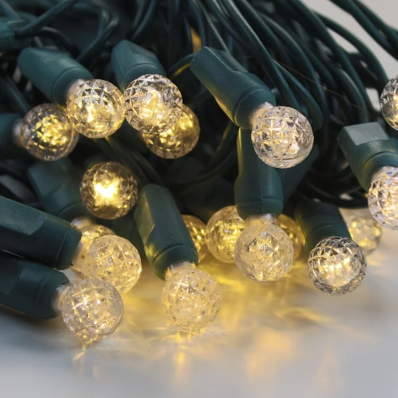 String Lights with Edison Bulbs for Rustic Ambiance50-light  G12 Warm White LED Christmas Lights, 4" Spacing Green Wire