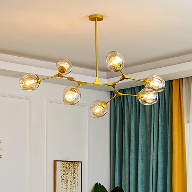 Chandeliers with Colored Glass for a Splash of ColorANKUR BRANCH ARM HEAD CHANDELIER Chandeliers with Colored Glass for a Splash of ColorANKUR BRANCH ARM HEAD CHANDELIER
