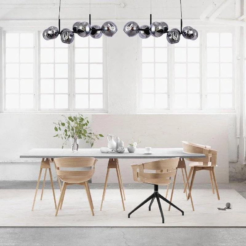 Minimalist Chandeliers for Sleek and Simple InteriorsANKUR JONUS 8 LIGHT SMOKE GREY WITH BLACK METAL LINEAR CHANDELIER Minimalist Chandeliers for Sleek and Simple InteriorsANKUR JONUS 8 LIGHT SMOKE GREY WITH BLACK METAL LINEAR CHANDELIER