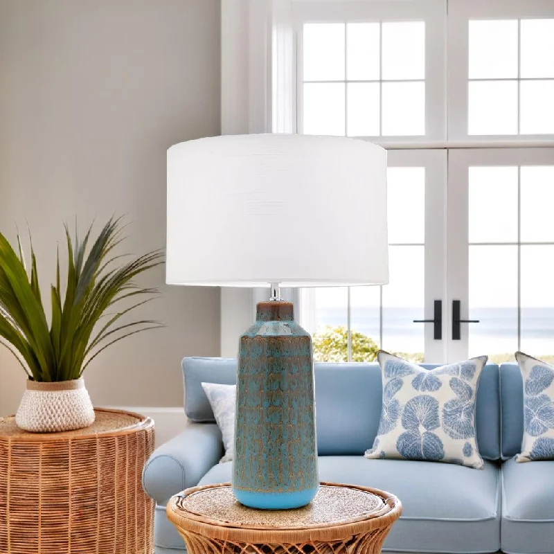 gothic style table lamps with dark finishes for a mysterious lookFarrow Table Lamp in Teal Ceramic w/ White Linen Shade gothic style table lamps with dark finishes for a mysterious lookFarrow Table Lamp in Teal Ceramic w/ White Linen Shade
