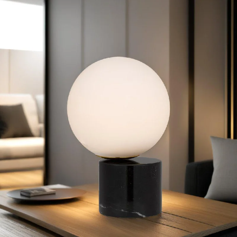 leather table lamps with a distressed texture for a rugged charmNovio Table Lamp in Antique Gold or Black leather table lamps with a distressed texture for a rugged charmNovio Table Lamp in Antique Gold or Black