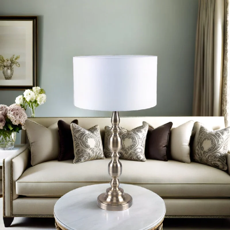 leather table lamps with a distressed texture for a rugged charmSandra Table Lamp in Antique Brass or Satin Chrome leather table lamps with a distressed texture for a rugged charmSandra Table Lamp in Antique Brass or Satin Chrome